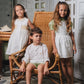 VESTIDO SMOCK DORADO