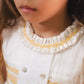 VESTIDO SMOCK DORADO