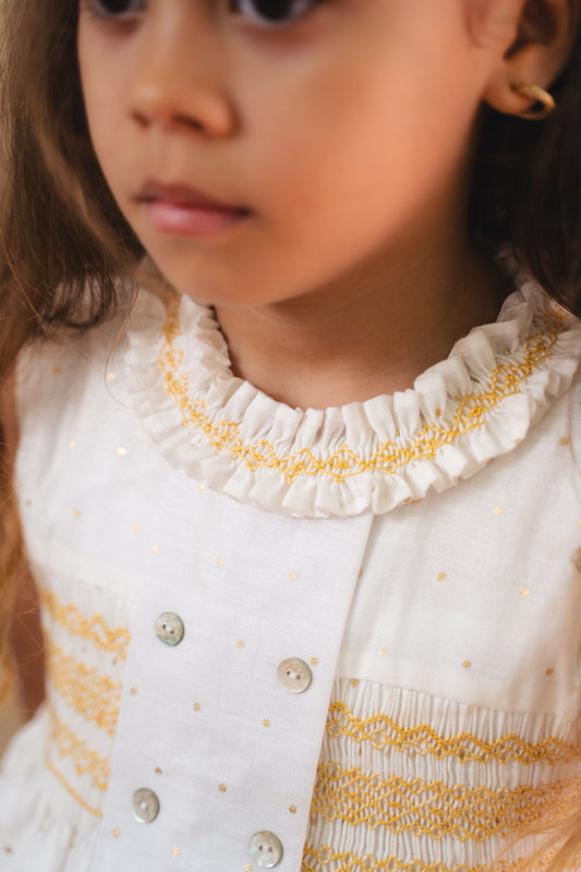 VESTIDO SMOCK DORADO