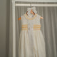 VESTIDO SMOCK DORADO